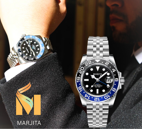 Silver watch with blue accents worn on a wrist, with a blurred background and 'Marjita' logo.